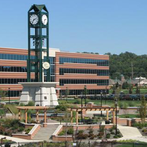 Homepage - Closeup View of Commercial Building and Clock Tower in Downtown West Chester